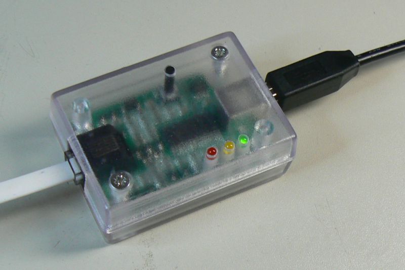 PK2M programmer in
      transparent enclosure